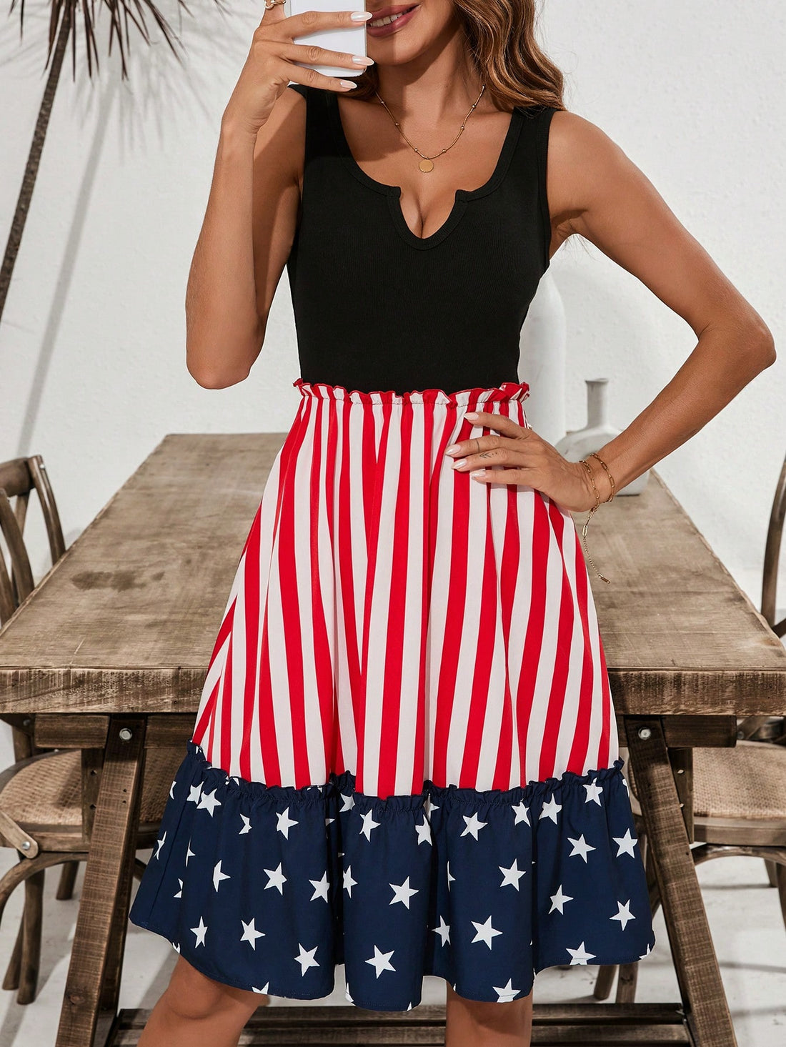 Celebrate Independence Day in style with our Clasi Patchwork Flag Print Dress. Made with ruffled pleats and a unique patchwork design, this dress is perfect for a chic and patriotic look. Show off your love for your country in this trendy and comfortable dress.