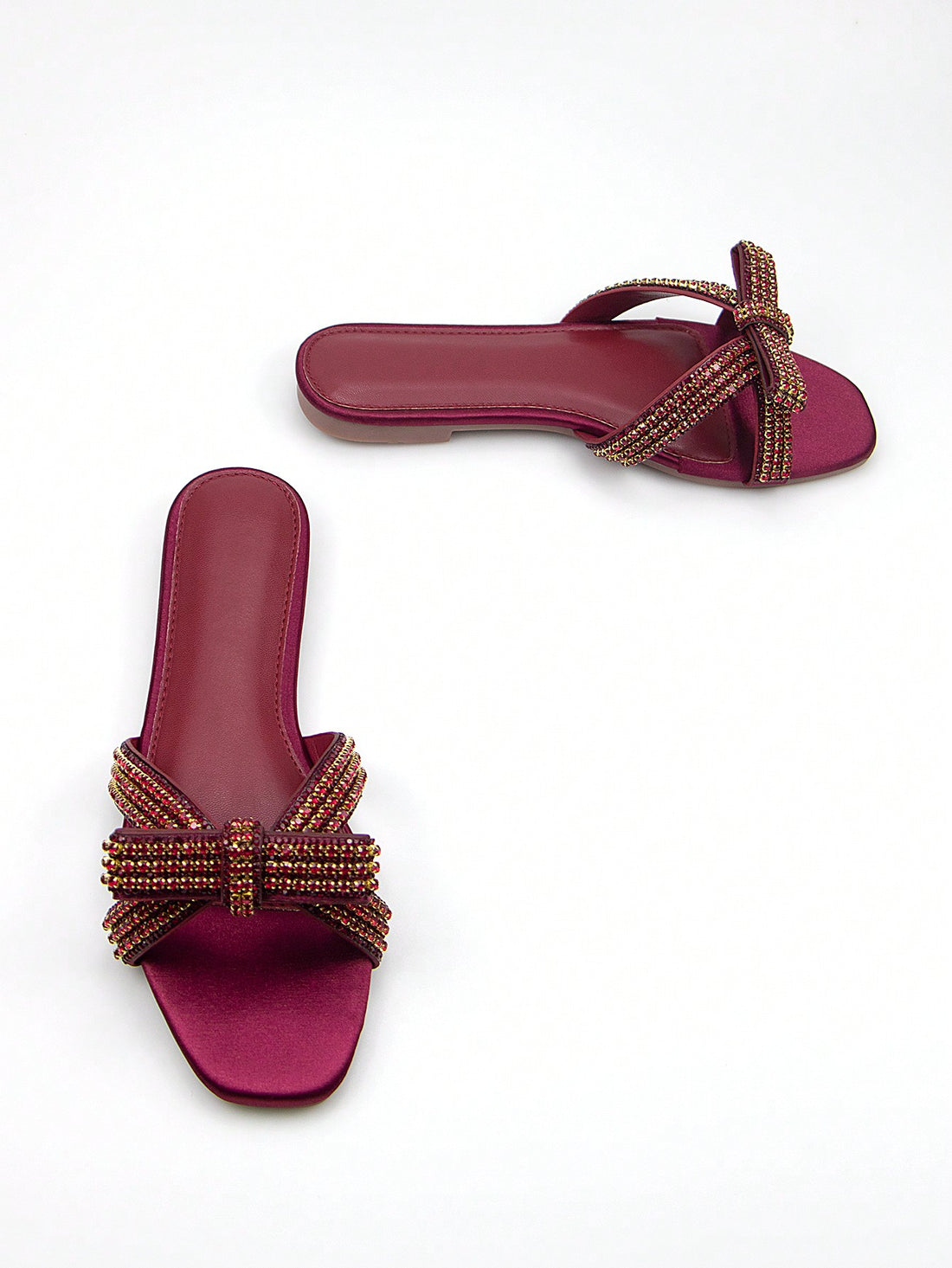 Step into sparkle with these eye-catching grey metallic flat sandals! The dazzling rhinestone chain bow adds just the right amount of bling to elevate your everyday look or make you shine at any party. Comfy enough for all-day adventures yet glam enough for evening escapades – these versatile beauties are ready to play whenever you are!