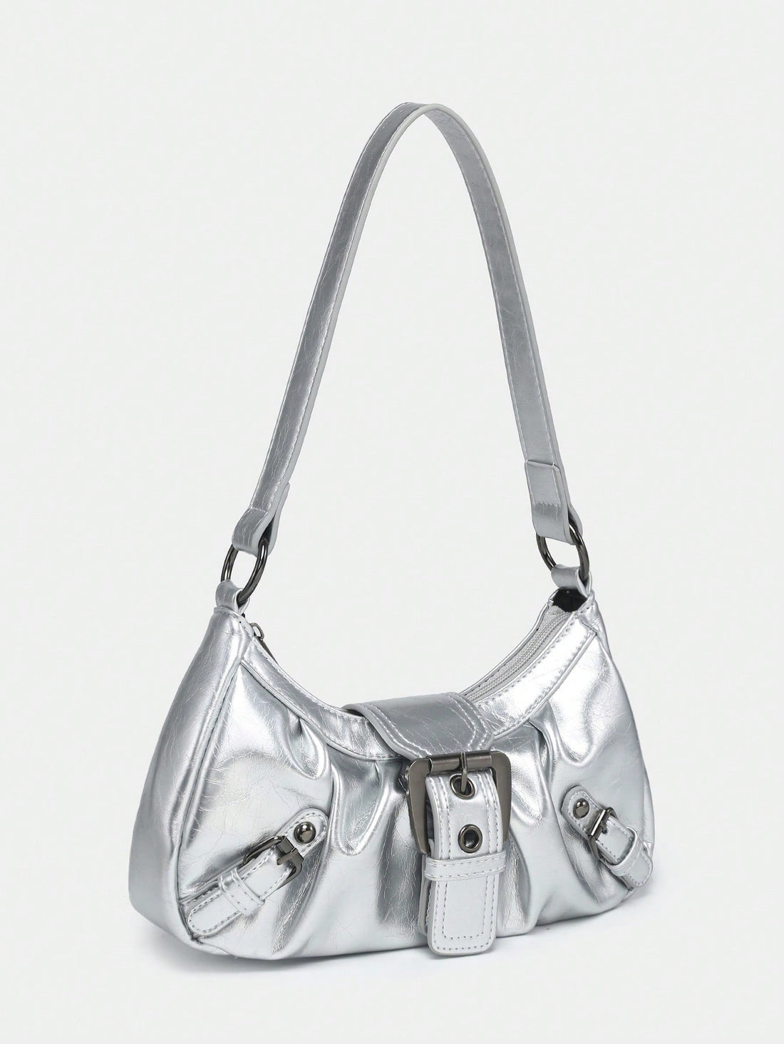 As a product expert in the fashion industry, let me introduce you to our Vintage Chic Leather Motorcycle Bag. Made with distressed leather and detailed with rivet pin buckle decoration, this bag combines style and functionality for an edgy yet practical accessory. 