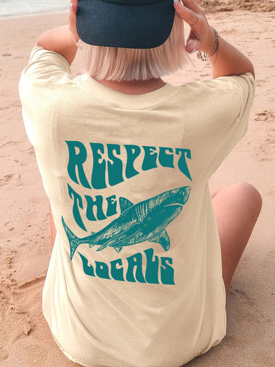 This Shark Summer Vibes t-shirt is the perfect addition to your summer wardrobe. Made for women, it features a casual round neck design with a fun slogan that captures the energy of the season. Made with high-quality materials, this t-shirt offers comfort and style for all your summer adventures.