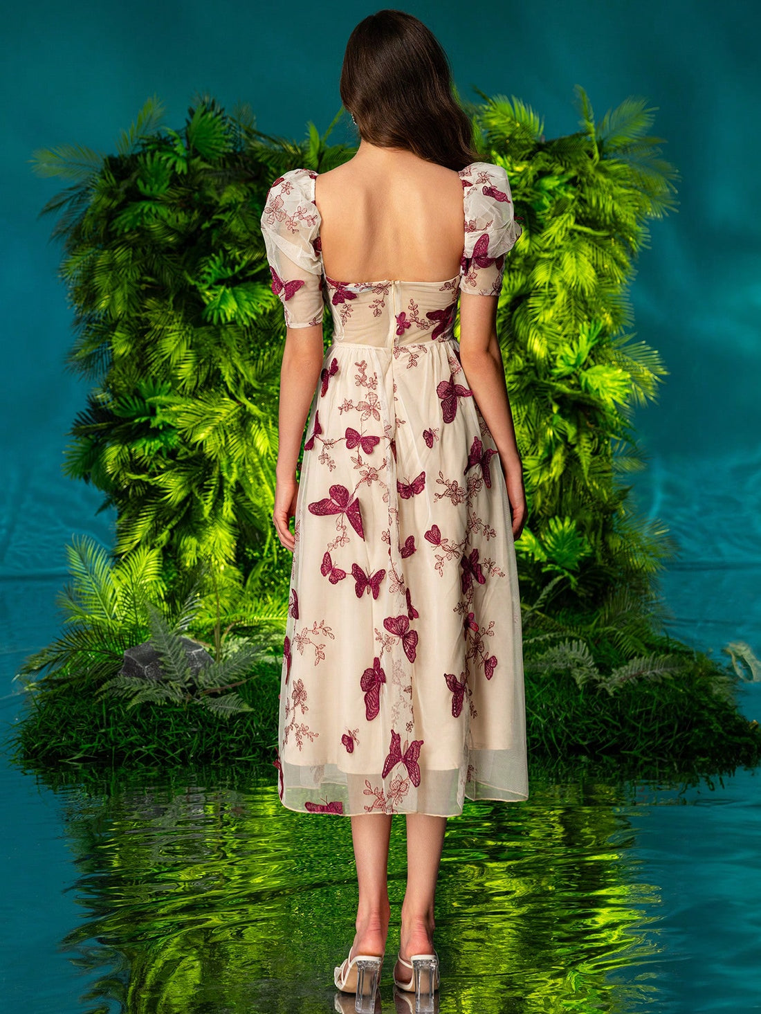 Introducing the Fluttering Beauty dress, designed for the elegant and sophisticated woman. This dress features double bubble sleeves and a 3D butterfly decoration, adding a touch of whimsy to its classic design. Perfect for any occasion, this dress exudes beauty and confidence.