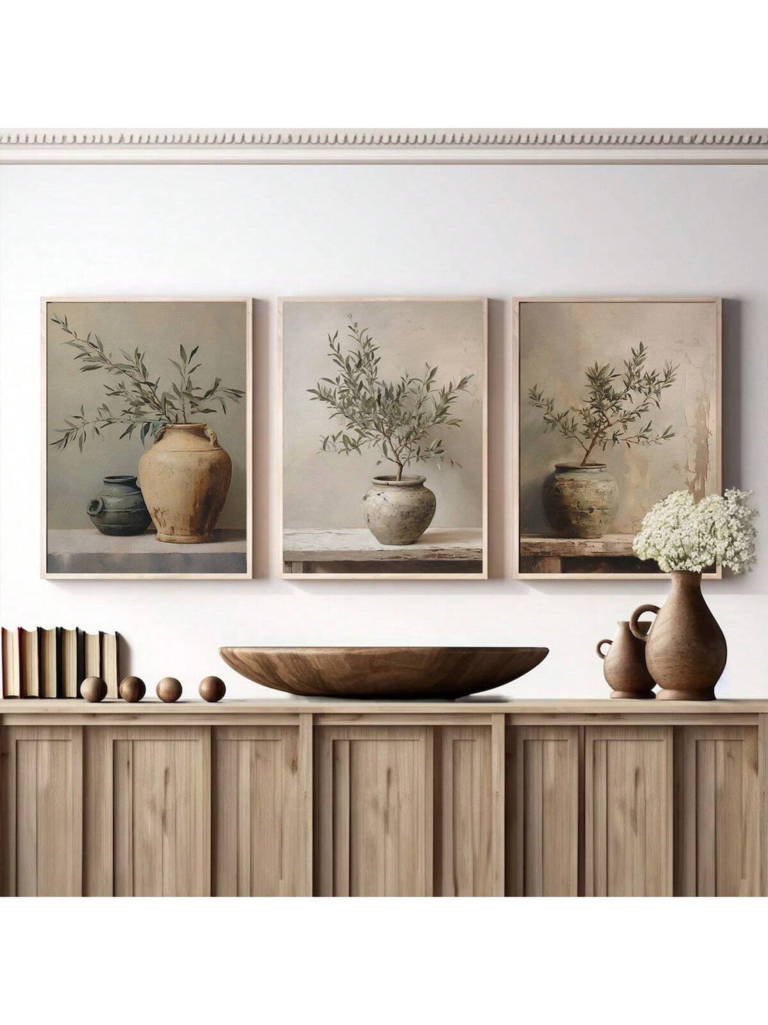 Enhance your home decor with this charming 3-piece set of Vintage Olive Tree Still Life Art Prints. These elegant prints showcase a soft and muted color palette, adding a touch of nostalgia to any room. Made with high-quality materials, these prints are the perfect addition to any art collection.