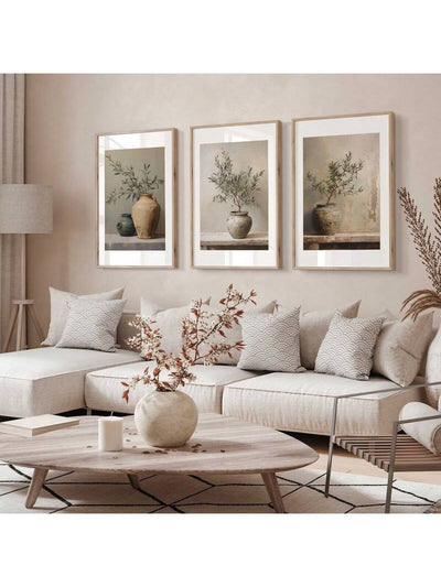 Enhance your home decor with this charming 3-piece set of Vintage Olive Tree Still Life Art Prints. These elegant prints showcase a soft and muted color palette, adding a touch of nostalgia to any room. Made with high-quality materials, these prints are the perfect addition to any art collection.