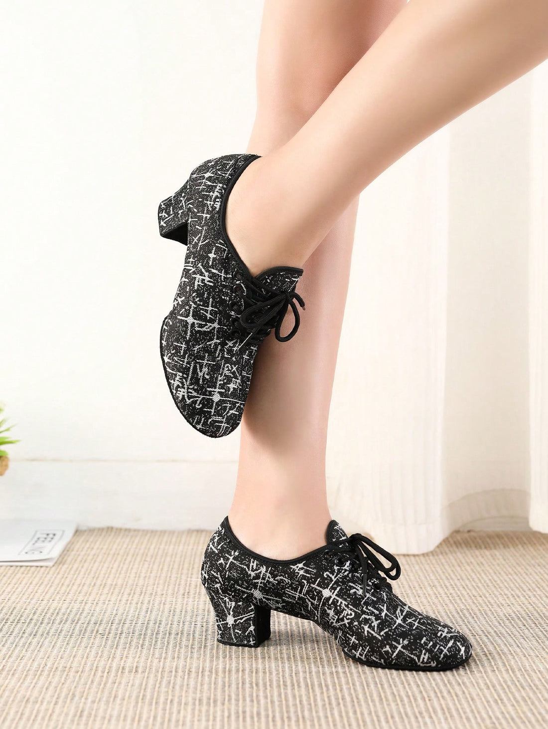 Designed for Latin Tango, these ballroom dance sneakers have a split sole for optimal flexibility and movement. The lace up design provides a secure fit, while the stylish design adds an extra flair to your dance steps. Bring your A-game to the dance floor with these shoes!