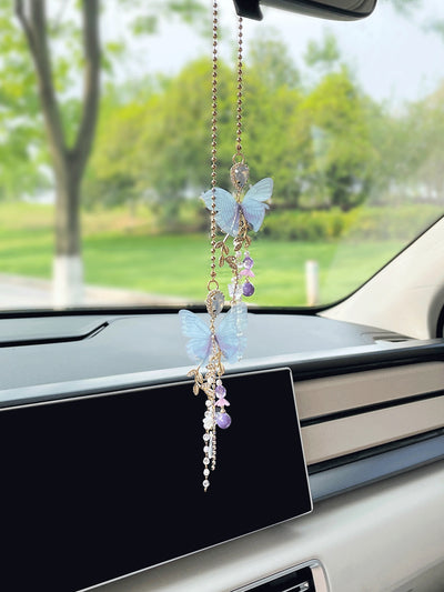 Add a touch of whimsy and elegance to your car's interior with our Fluttering Charm: Butterfly Car Pendant. The intricate butterfly design will bring a sense of wonder and beauty to your daily commute. Perfect for any woman who loves to express her unique style.