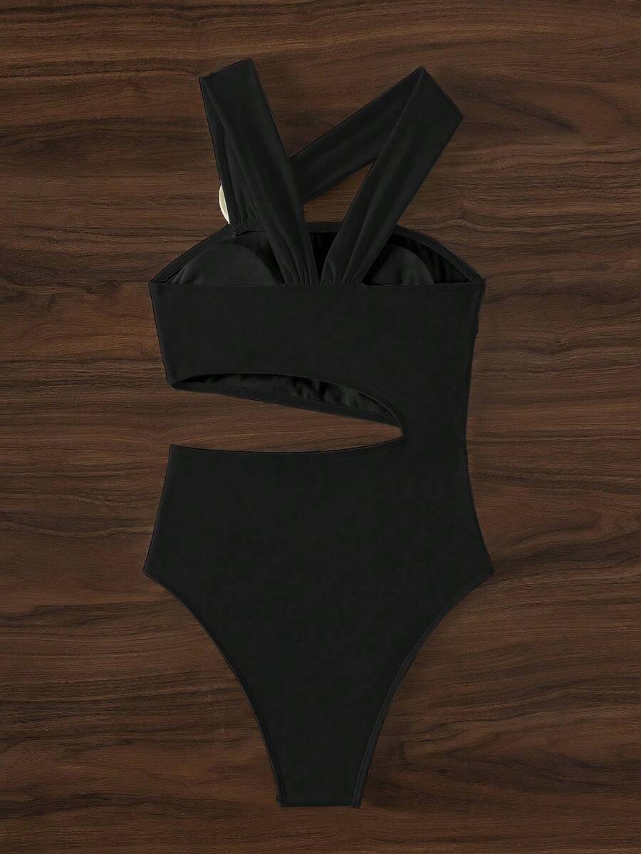 Make a statement this summer with our Chic Hollow-Out One-Piece Swimsuit, designed for those who want elegance with an edge. The strategic hollow-out detailing creates a flattering silhouette while maintaining sophisticated coverage. Intricate 3D floral accents add dimension and visual interest, elevating your beach look beyond the ordinary. The adjustable neck strap ensures a secure, customizable fit for all-day comfort. 