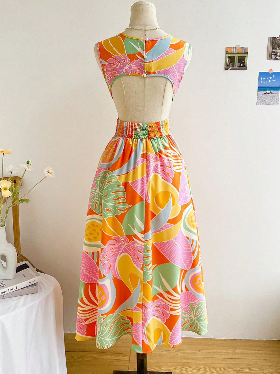 Get ready to embrace the tropical vibes with this vibrant women's V-neck dress! The playful A-line silhouette and open back add a flirty touch, while the eye-catching plant print will have you feeling like you're on vacation all year round. Say aloha to effortless style!