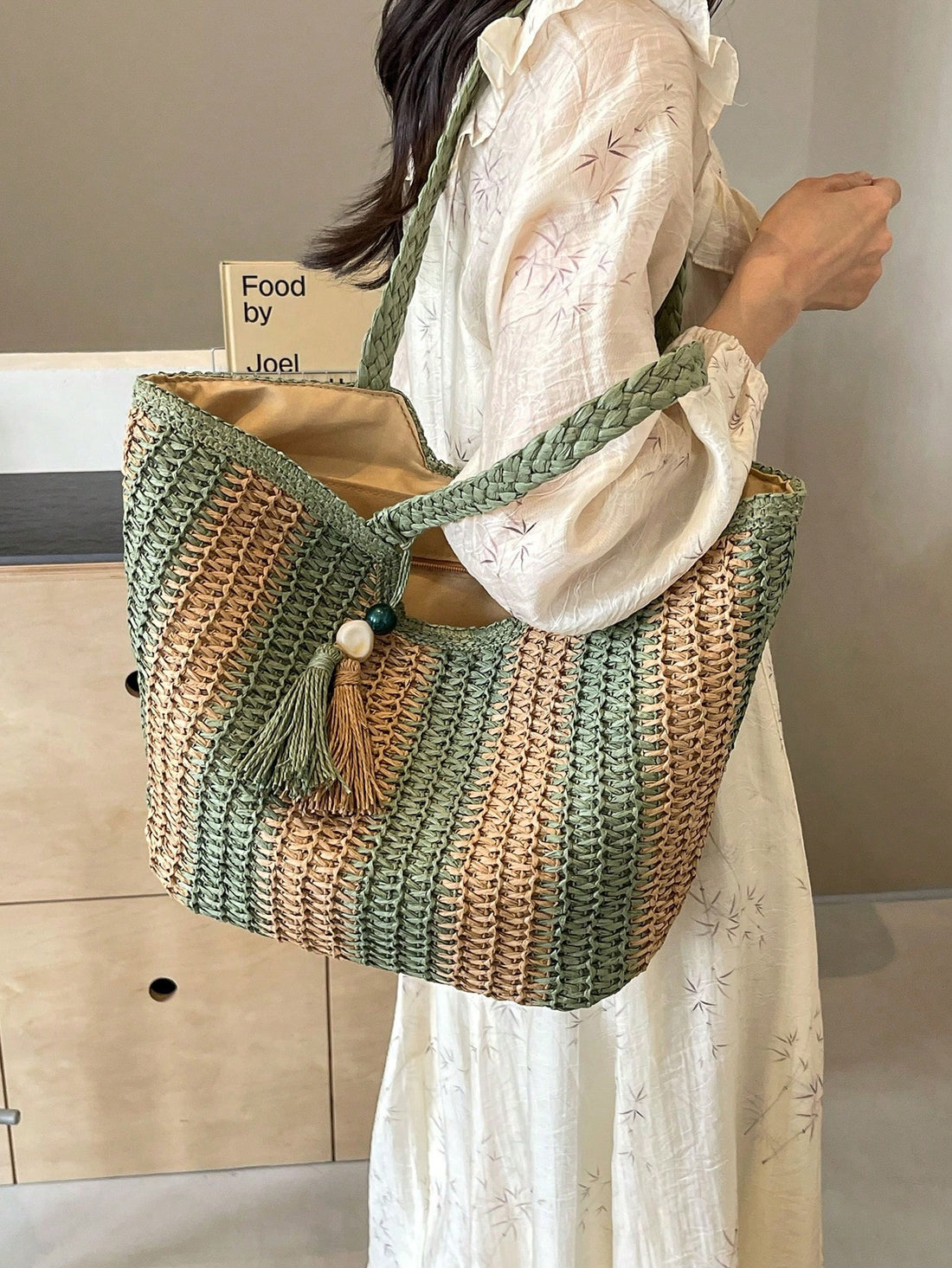 Expertly crafted from woven straw, the Chic and Roomy tote bag is perfect for the minimalist woman. With its spacious design, it effortlessly blends style and functionality. Whether for a day at the beach or a weekend getaway, this bag is sure to elevate any outfit.