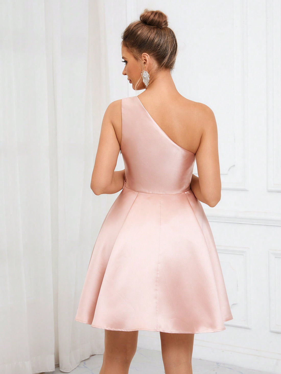 Elevate your wardrobe with this Lotus Pink Satin One-Shoulder A-Line dress. The luxurious fabric and elegant design exude sophistication and charm. Perfect for any occasion, this dress will make you feel confident and poised. Add a touch of elegance to your life with this must-have piece.