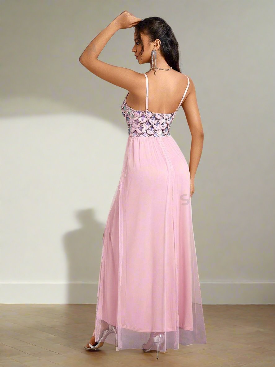 Elevate your summer style with our Shimmering Belle dress! Featuring a stunning sequined mesh design, this dress will make you stand out from the crowd. Perfect for any occasion, its light and airy feel will keep you cool while adding a touch of glamour to your wardrobe.