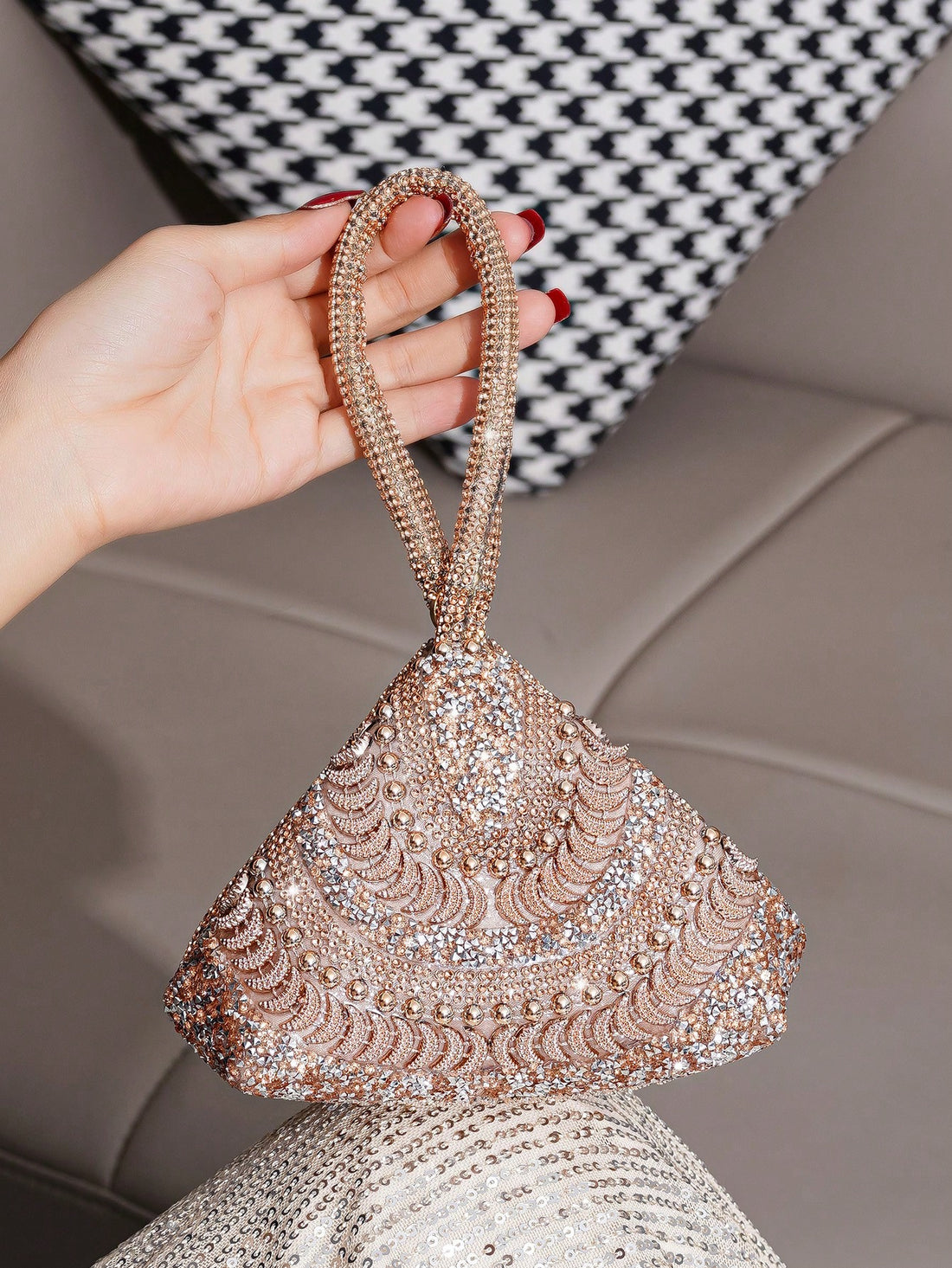 Make a statement at any party with our Dazzling Diamond Evening Clutch. This glittery handbag is crafted to perfection, making it perfect for any sparkling occasion. Its stunning design and intricate details will surely turn heads. Be the star of the night with our elegant and luxurious clutch.