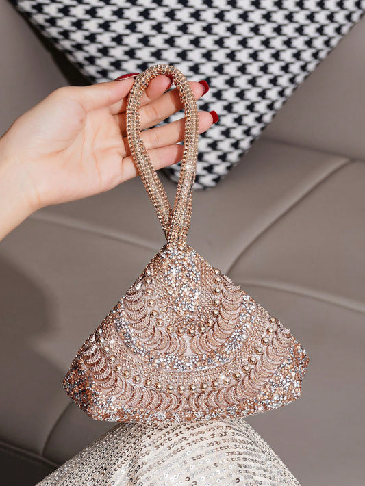 Make a statement at any party with our Dazzling Diamond Evening Clutch. This glittery handbag is crafted to perfection, making it perfect for any sparkling occasion. Its stunning design and intricate details will surely turn heads. Be the star of the night with our elegant and luxurious clutch.
