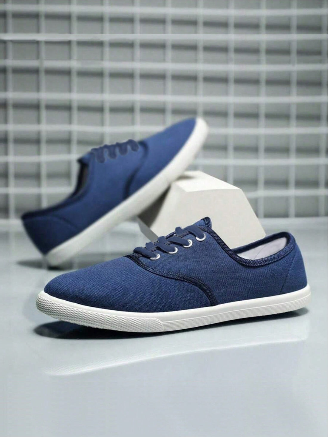 Embrace comfort and style with Stride in Style: Unisex Athletic Canvas Lightweight Running Shoes. Designed for both men and women, these shoes provide optimum support and cushioning for your workouts. Made with lightweight and durable materials, they'll keep you moving in style and comfort.