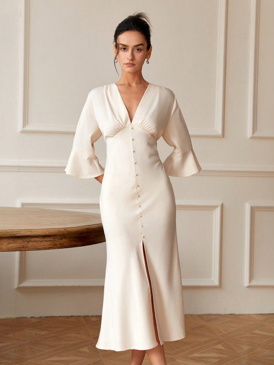 Dress to impress with our Chic and Elegant V-Neck Flare Sleeve Dress for women. The stylish v-neck design and flared sleeves give this dress a sophisticated touch. Made with high-quality materials, it's comfortable and perfect for any occasion. Elevate your wardrobe with this must-have dress.