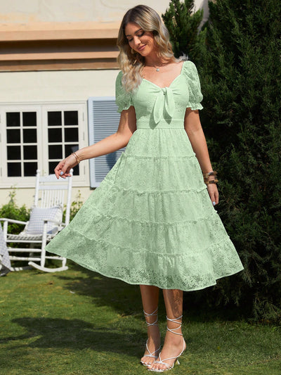 This Lovely Lace dress features a flattering sweetheart neckline and delicate lace detailing throughout. The front tie adds a touch of femininity and charm to this elegant and timeless piece. Made with high-quality materials, this dress is both comfortable and stylish, making it perfect for any occasion.