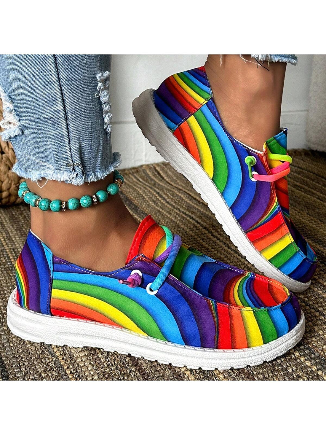 Introducing Rainbow Steps: Women's Colorful Printed Casual Sneakers. Embrace bold style with our vibrant, eye-catching design. Made from durable materials, these sneakers provide both fashion and function. Perfect for casual wear, these shoes will add a pop of color to any outfit. 