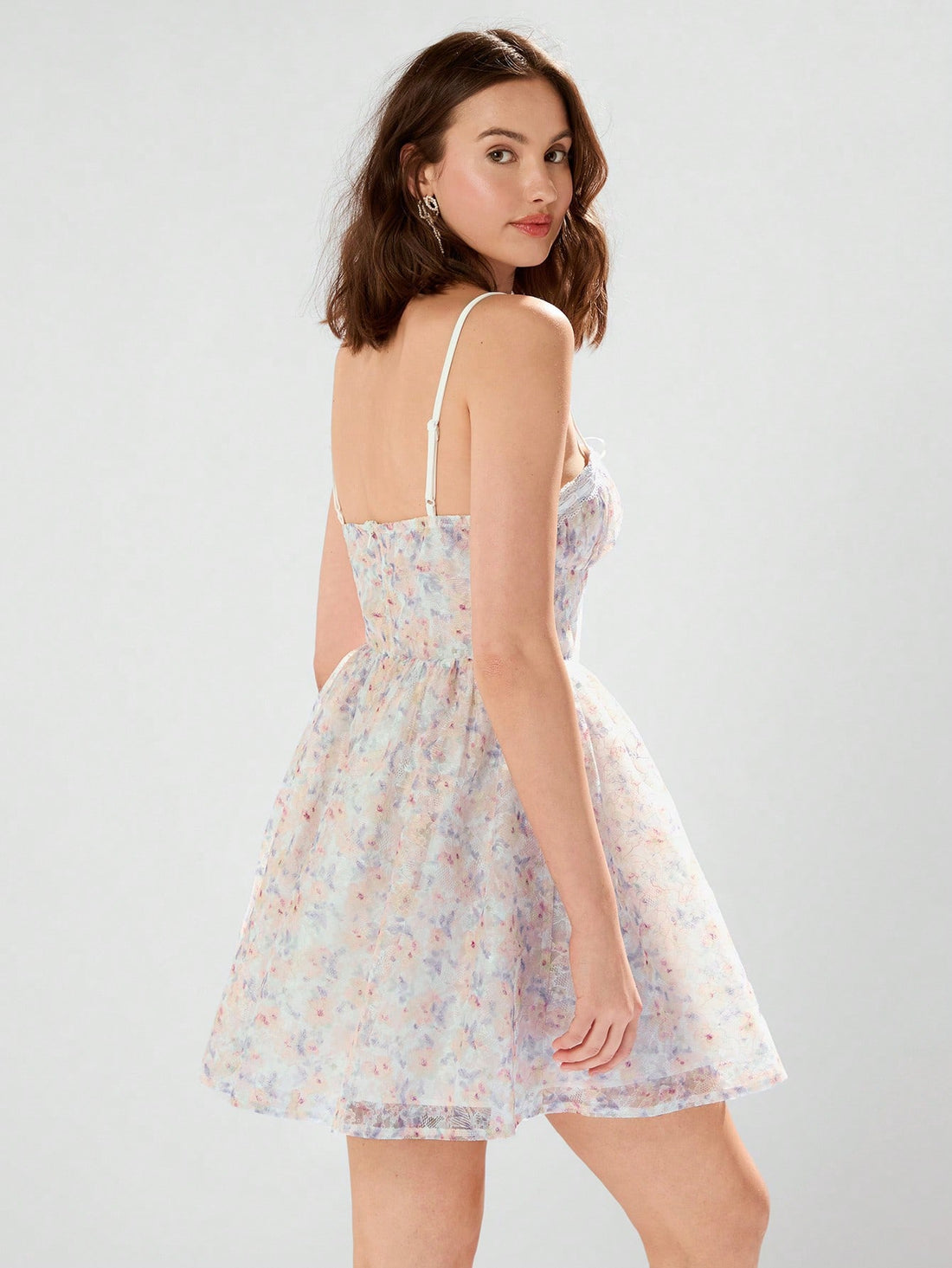Slip into summer style with our Radiant Summer Elegance dress. Featuring ditsy floral patterns, delicate lace, and spaghetti straps, this dress exudes effortless elegance. Perfect for any sunny occasion, it's the epitome of chic and playful fashion.