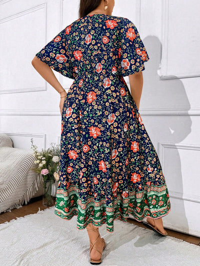 Floral Bliss Plus Size Holiday Dress: Flared Hem & Cinched Waistline