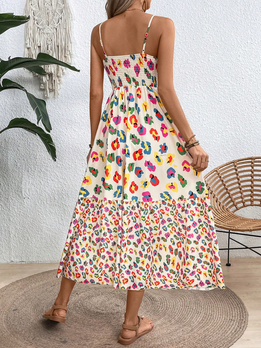 This Vibrant Vibe Camisole Dress is a must-have for everyday chic style. Made with high-quality materials, it is both comfortable and stylish. The vibrant print adds a touch of personality, making it perfect for any occasion. Elevate your wardrobe with this versatile and trendy piece.