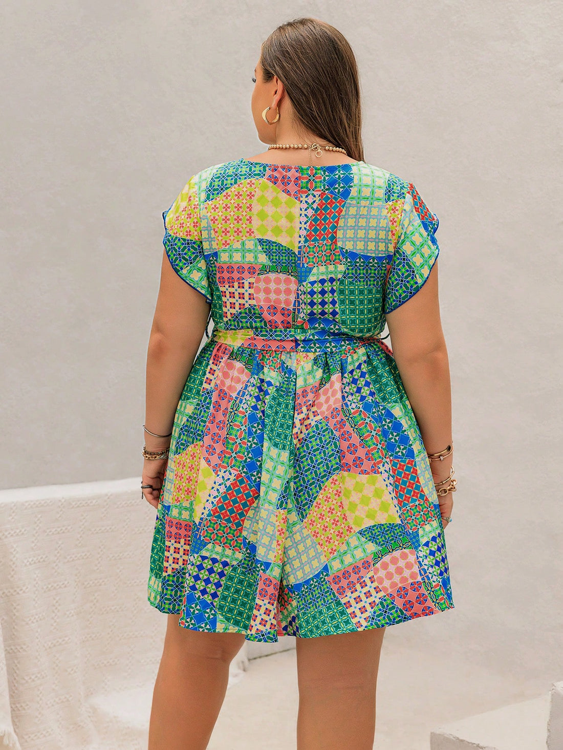 Elevate your vacation style with the Bohemian Paradise dress. Featuring a vibrant, printed design, this plus size dress is perfect for any getaway. The flowy fit and lightweight fabric provide both comfort and style, making it a must-have for any fashion-forward traveler. Add this dress to your wardrobe and make a statement wherever you go.