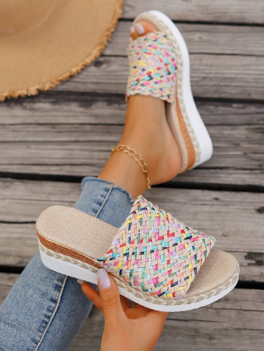 Step into summer fun with these colorful woven wedge heel platform sandals! Designed for stylish comfort, their vibrant hues and playful texture add a pop of personality to any outfit. The wedge heel gives you a lift while keeping your feet cozy all day long. Perfect for sunny days, casual outings, or dancing the night away in style!