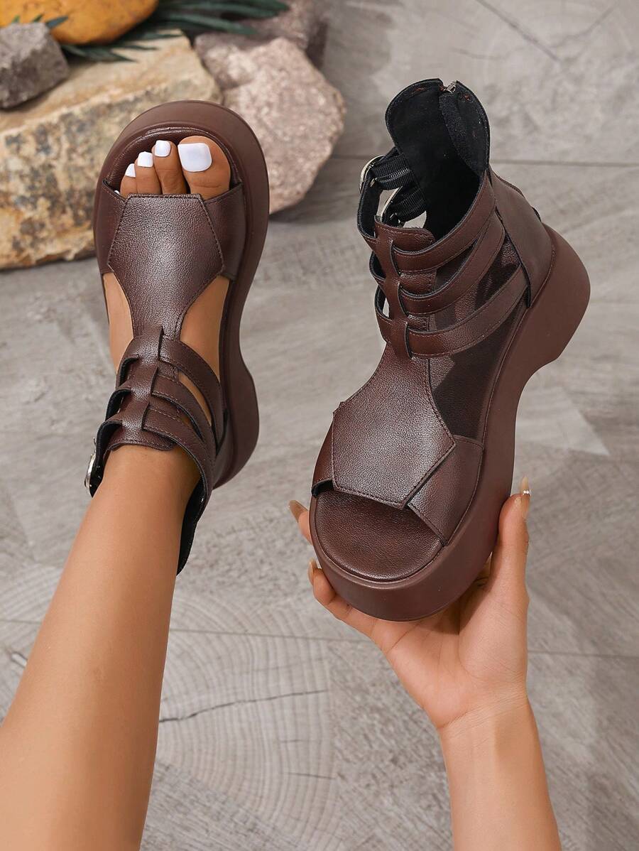 Handheld and on-foot view of chocolate-brown gladiator platform sandal booties