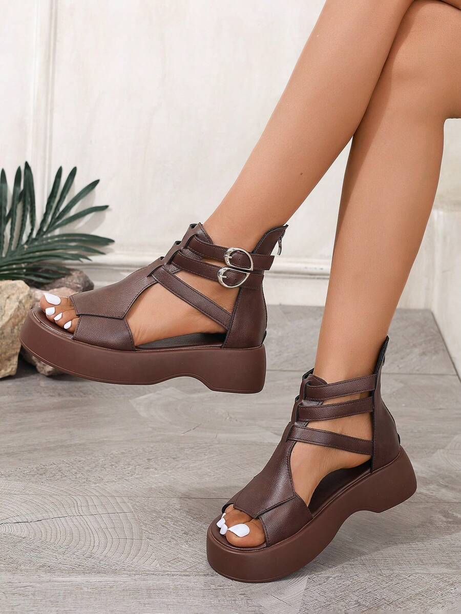Handheld and on-foot view of chocolate-brown gladiator platform sandal booties