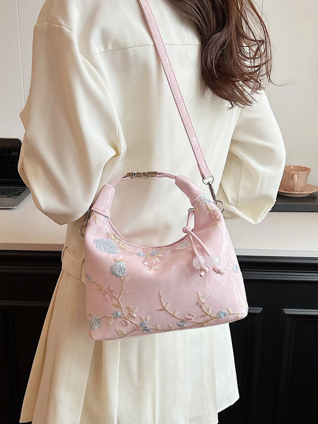 Experience effortless elegance with the Chic Floral Fantasy tote bag. Featuring a lightweight design, this bag combines style and convenience for the modern woman. The chic floral pattern adds a touch of sophistication, making it the perfect accessory for any occasion. Elevate your fashion game with this must-have tote.