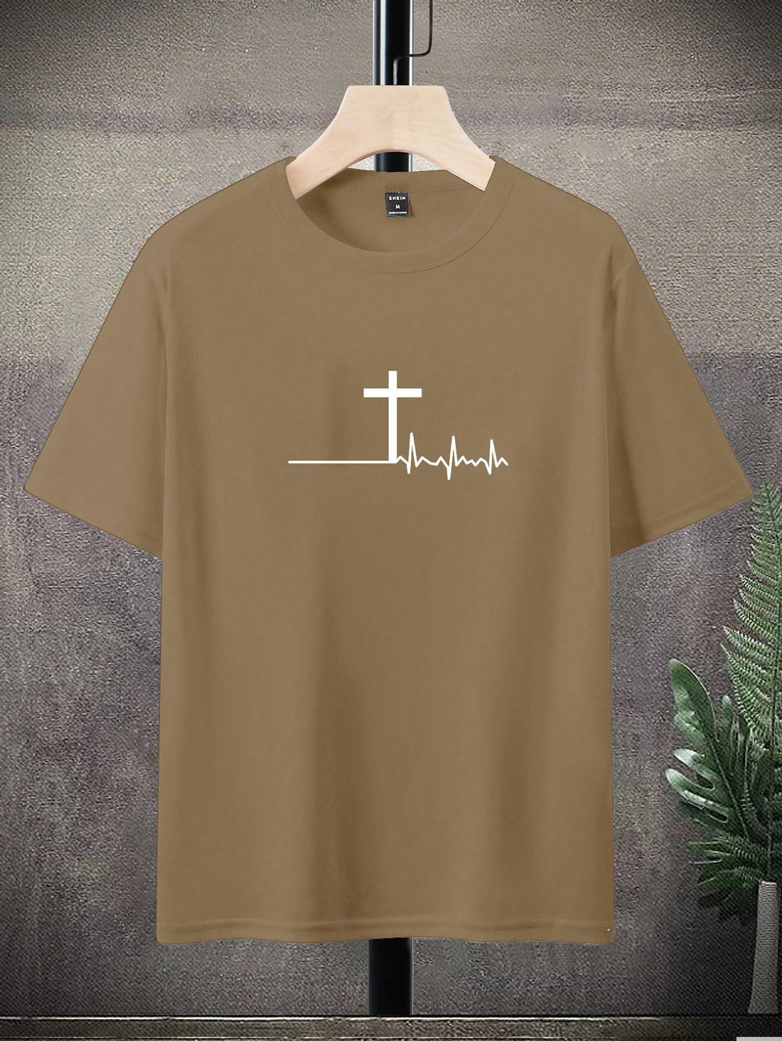 Get your Summer Vibes on with this playful and stylish Men's Casual Cross-Printed Round Neck T-Shirt. Show off your fun side with the quirky cross print and enjoy the comfort of the round neck design. Perfect for any summer occasion, this t-shirt is a must-have for your wardrobe!