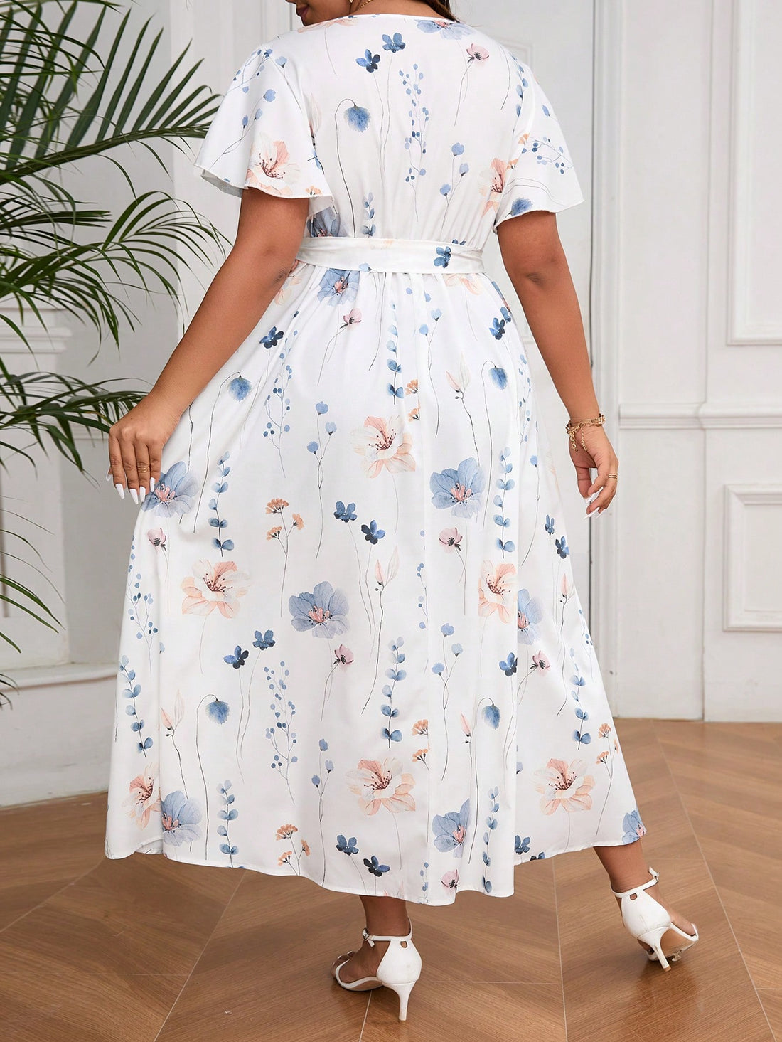 Step into sunshine and style with this Plus Size Summer V-Neck Floral Jumpsuit Dress! Its breezy fabric and playful split hem keep you cool and flirty, while the vibrant floral print adds a splash of vacation vibes. Perfect for beach days or casual outings, this jumpsuit effortlessly combines comfort with a fun, flattering fit you'll love showing off.