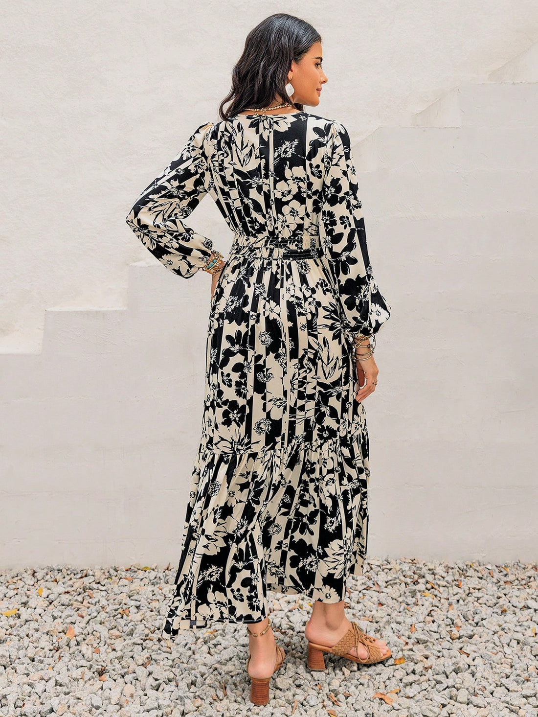 Effortlessly elevate your holiday style with our Chic Bohemian Floral Lantern Sleeve Dress. The delicate floral pattern paired with lantern sleeves adds a touch of bohemian charm. Perfect for any occasion, this dress will have you looking chic and stylish without any effort.