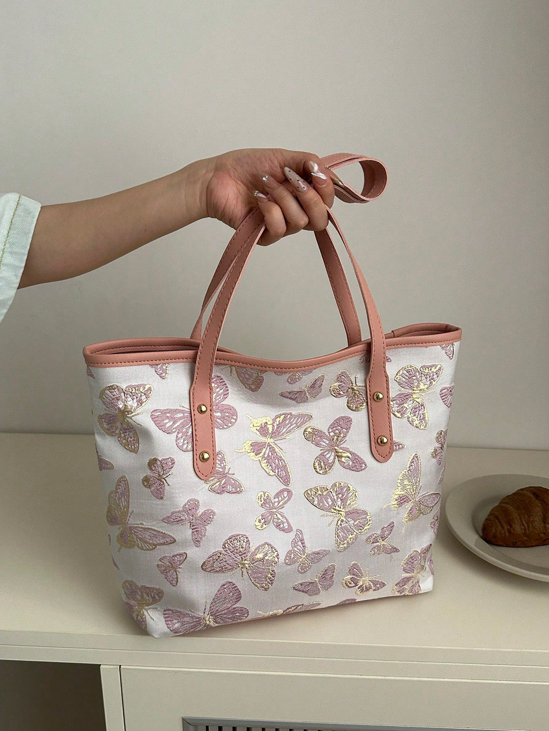 Make a statement with the Colorful Embroidered Bow Handbag - the ultimate fashion accessory for women on-the-go! With its vibrant colors and intricate embroidery, this handbag is perfect for adding a touch of style to any outfit. Stay organized with its spacious interior and be the envy of everyone with this eye-catching bag.