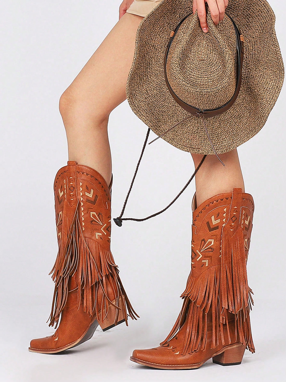 Experience the perfect blend of style and durability with our Vintage Western Fringe Cowgirl Boots. Made for women, these boots feature a stylish vintage design and sturdy construction, ensuring long-lasting wear. Elevate your western look with these timeless boots.