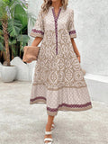 Beige geometric print midi dress front view with notched V neckline