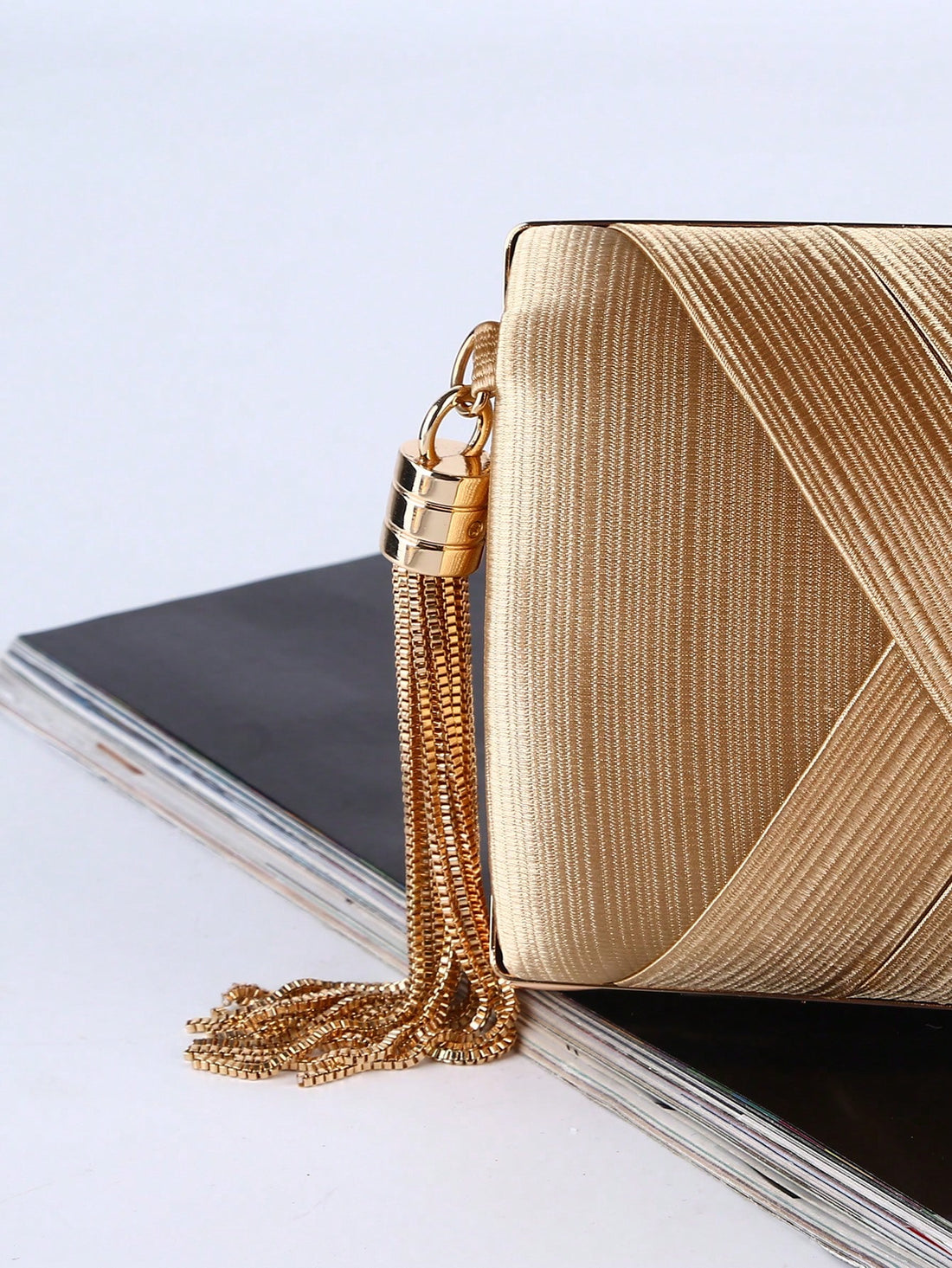 Add a splash of charm to your evening with this Elegant Handmade Tassel Evening Bag. Crafted from smooth silk, it offers plenty of space for your essentials while keeping your look effortlessly chic. The playful tassel detail adds a fun twist to formal events, making it the perfect companion for nights filled with laughter and style.