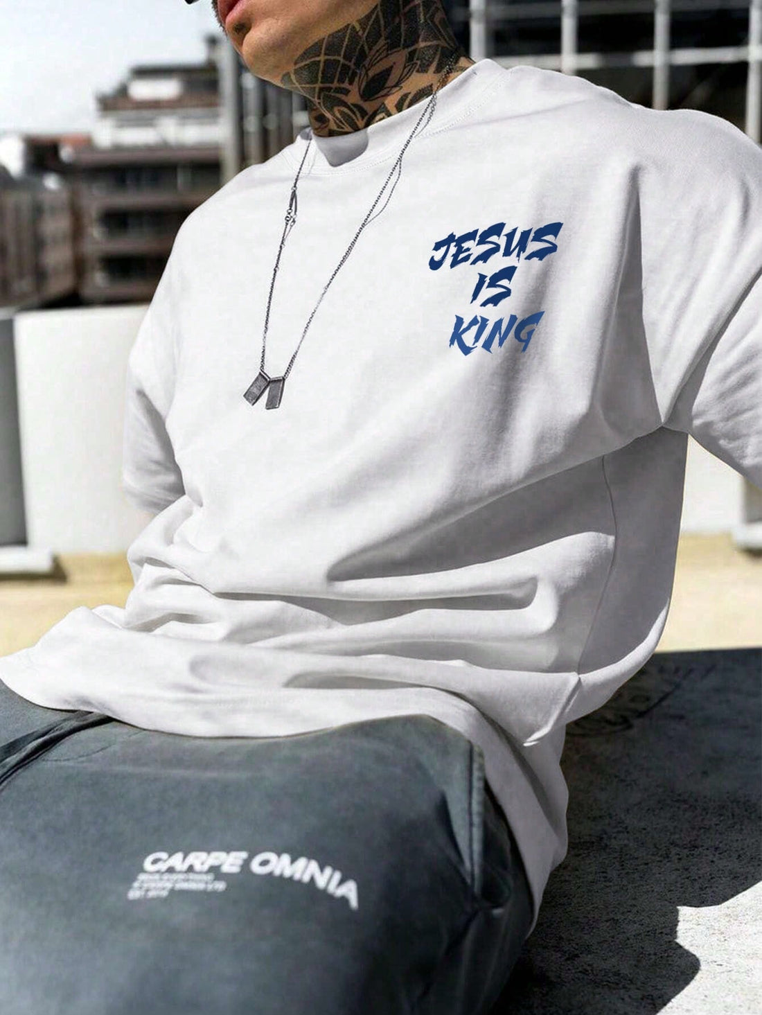 Step up your t-shirt game with our Men's Round Neck T-Shirt. Make a statement with our bold slogan print. Rely on the softness of our fabric, and add a touch of personality to any outfit. Elevate your style with this must-have addition to your wardrobe.