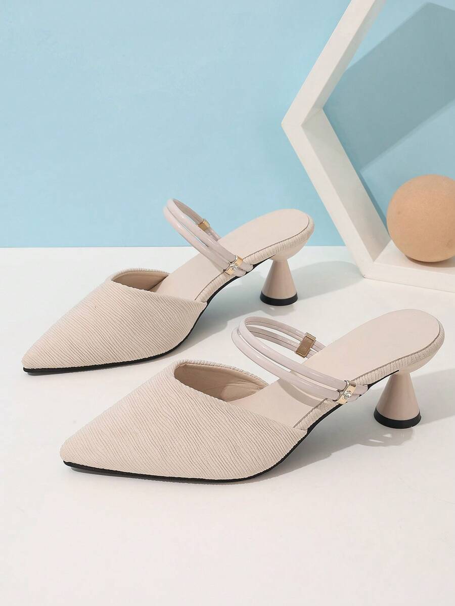 Step into style with these Chic Pointed Toe High Heeled Mules, perfect for spring and autumn adventures. Their sleek pointed design adds a touch of elegance, while the versatile two-way slipper feature lets you switch up your look with ease. Whether you're dressing up or keeping it casual, these mules bring playful flair and refined comfort to every step you take.