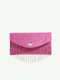 Side view of chic metallic coated straw woven clutch bag with chain and tassel - ideal for summer vacations with metallic finish, woven straw texture, woven texture for vacation styling