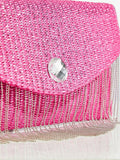 Close-up view of chic metallic coated straw woven clutch bag with chain and tassel - ideal for summer vacations with metallic finish, woven straw texture, woven texture for vacation styling