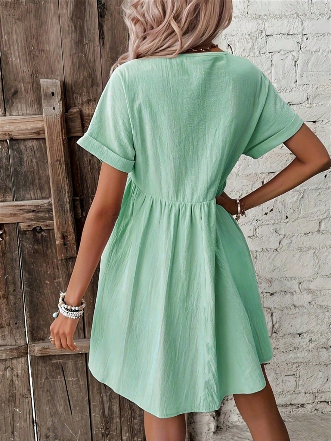 Unleash your inner fashionista with our Chic and Stylish Women's Batwing Sleeve V-Neck Dress. This dress features batwing sleeves and a flattering V-neck, perfect for any occasion. Made with a solid color, it is versatile and easy to dress up or down. Elevate your wardrobe and stand out with this must-have piece.