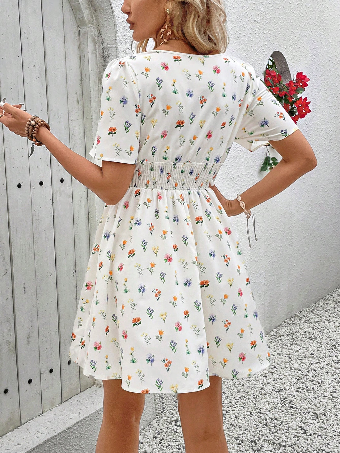Effortlessly achieve a charming summer look with our Ditsy Floral Cinching Waist Dress. The elegant floral print and cinched waist create a flattering silhouette, perfect for any occasion. Stay stylish and comfortable with this must-have dress.