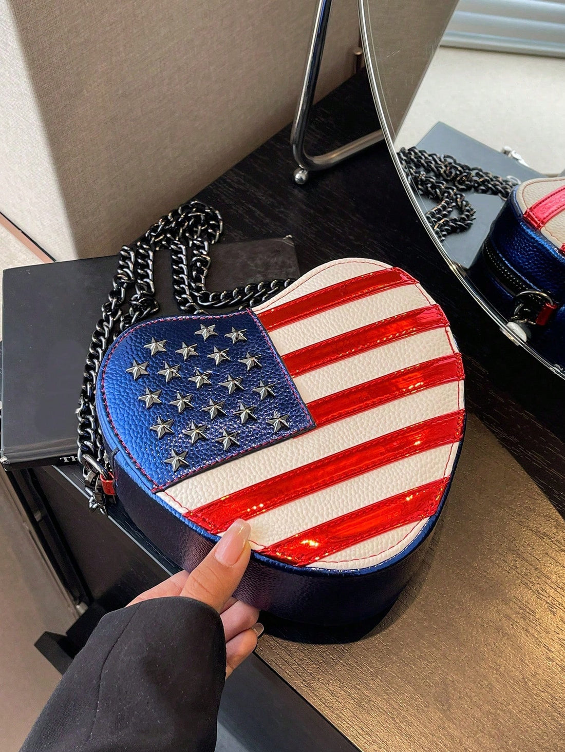 Elevate your style with our Star-Spangled Love Crossbody Bag. This versatile accessory adds a unique touch to any outfit, making it perfect for every occasion. Its eye-catching design and functionality make it a must-have for those who value both fashion and practicality. 