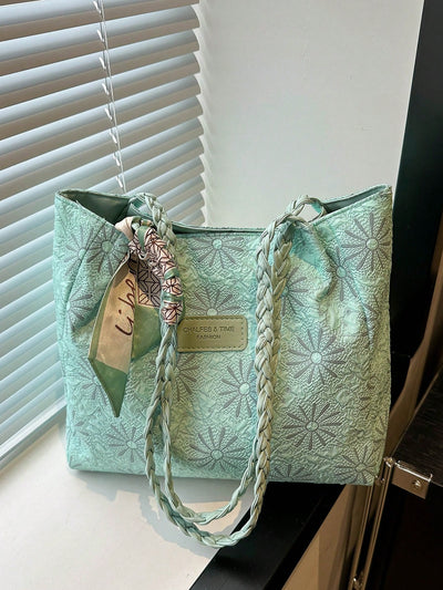 Experience ultimate convenience and style with our versatile Stylish Green Printed Shoulder Tote. Designed specifically for the modern woman on the go, this bag offers ample storage for all your essentials, while the eye-catching print adds a touch of personality to your look.