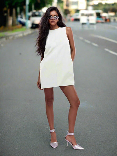 Chic and Elegant: Sleeveless Bow Tie Backless Mini Dress