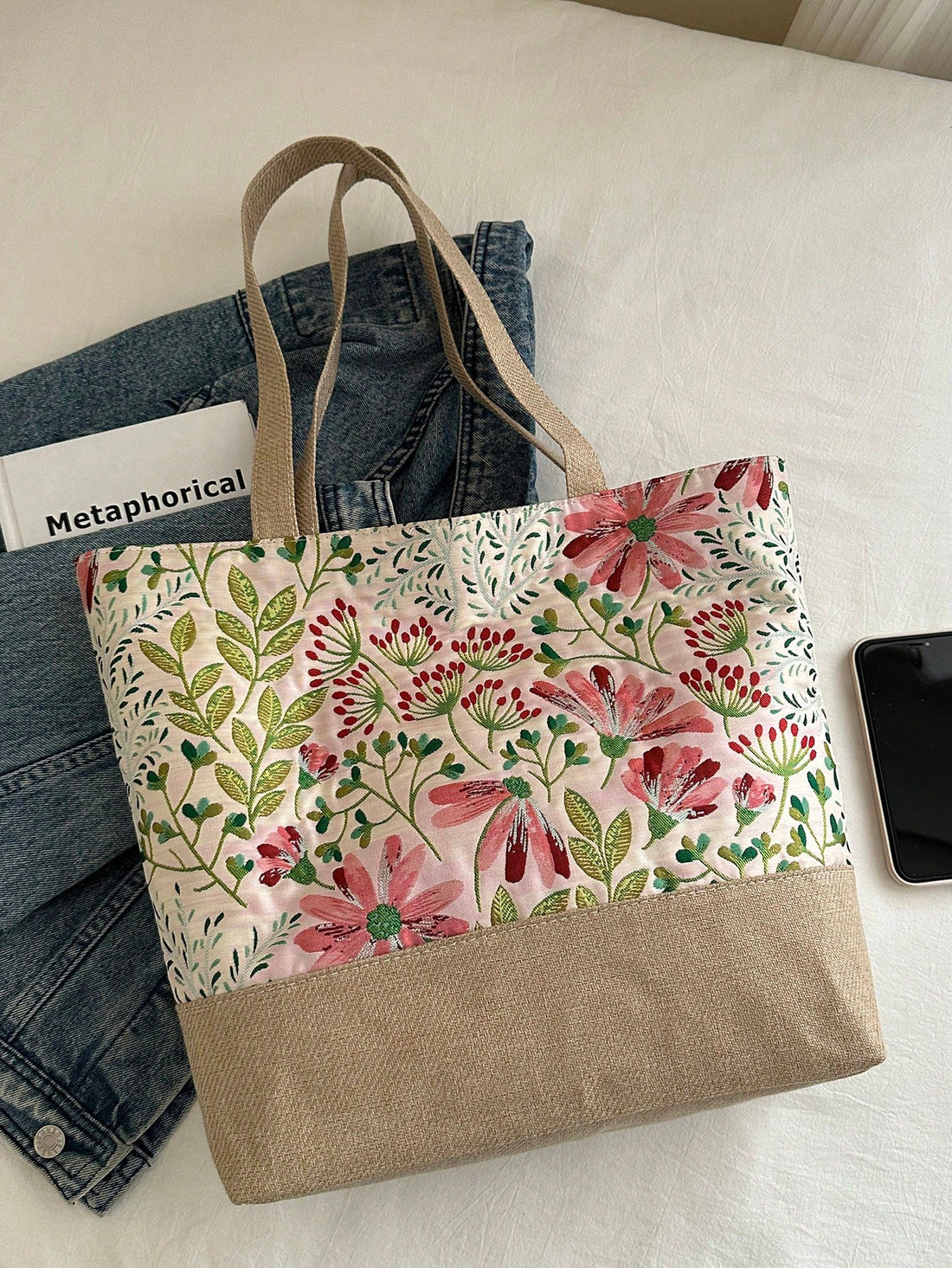 Introducing the Floral Pattern Tote Bag, the must-have accessory for women on the go! With its stunning floral pattern, this bag is both stylish and functional. Its spacious interior and durable materials make it the perfect companion for any occasion. A must-have for any fashion-forward woman.