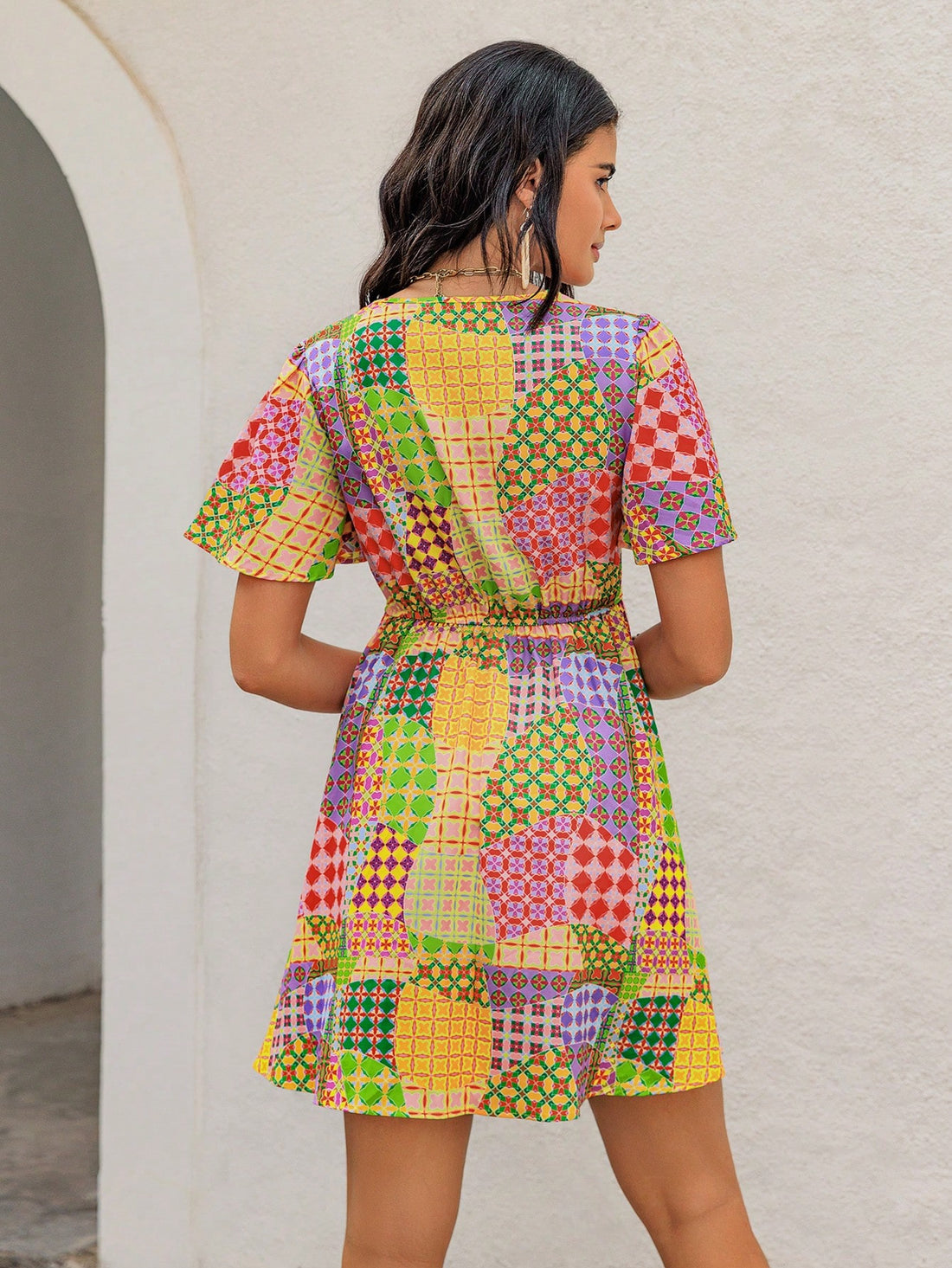 Upgrade your holiday wardrobe with our Holiday Patchwork Short Dress. Perfect for any occasion, this dress combines casual chic with a unique patchwork design. Look effortlessly stylish and stand out from the crowd this holiday season.