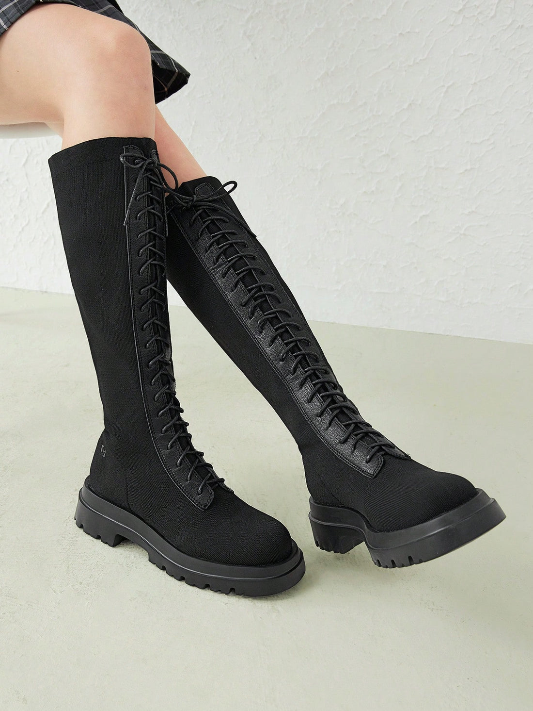 Introducing the must-have footwear for this season - the New Fashion: Slip-On Stretch Knee-High Black Sock Boots. Made with high-quality materials, these boots provide the perfect blend of fashion and comfort. The slip-on design and stretch knee-high fit offer ease of wear, while the timeless black color adds a touch of sophistication to any outfit. Upgrade your shoe collection with these trendy boots.