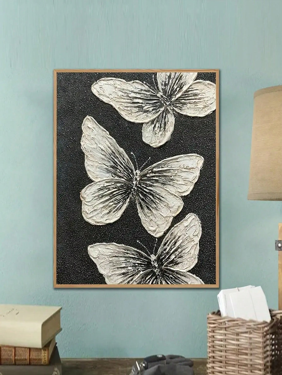 Add a touch of elegance to any space with the Monochrome Butterfly Trio. Each hand-painted piece features delicate butterflies in monochrome colors, adding a sense of sophistication and charm to your home decor. With this wall art decoration, you can effortlessly elevate the style of any room.