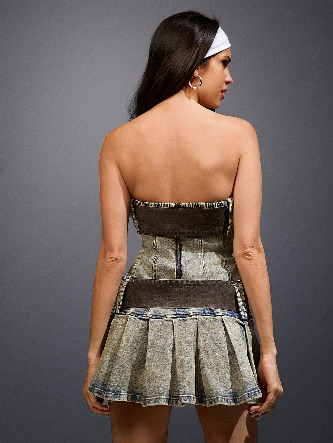 Effortlessly elevate your style with our Chic Belted Pleated Tube Dress. The perfect blend of elegance and comfort, this dress features a belted waist and pleated design for a flattering silhouette. Get ready to turn heads and feel confident in this must-have addition to your wardrobe.