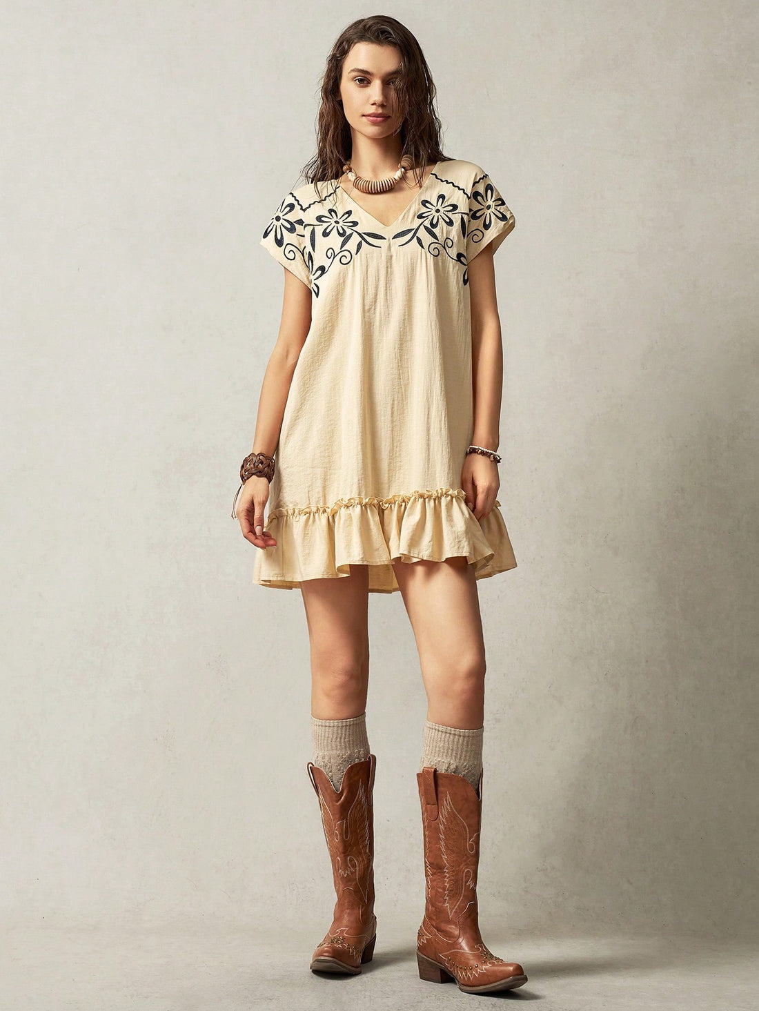 Elevate your vacation style with the Boho Bliss: Embroidery Decorated Vacation Shoulder Strap Dress. Featuring delicate embroidery and a chic shoulder strap design, this dress effortlessly combines fashion and comfort. Perfect for any adventure, this dress is a must-have for your next getaway.